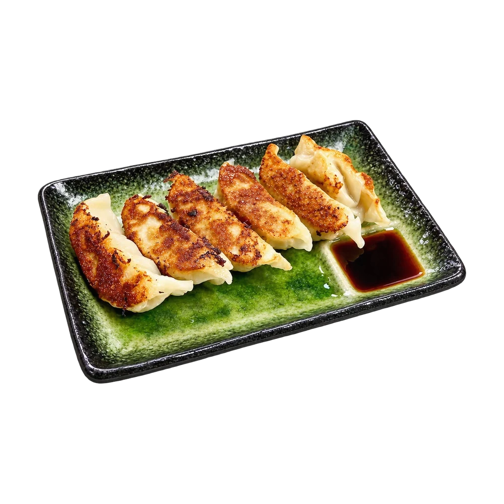 Pan fried pork gyoza with dipping sauce